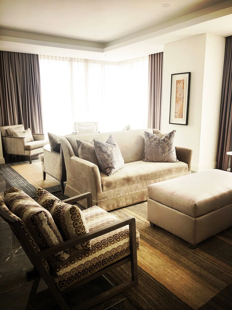 A softly lit living room with a comfortable sofa.